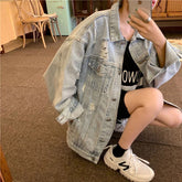 Vintage zerrissene Jeansjacke in Übergröße